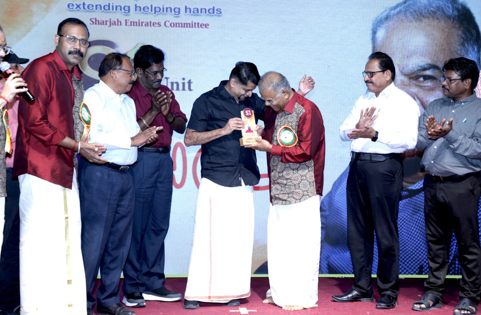 Trophy presentation ceremony recognizing excellence